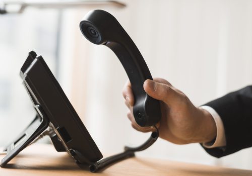 businessman-holding-headset
